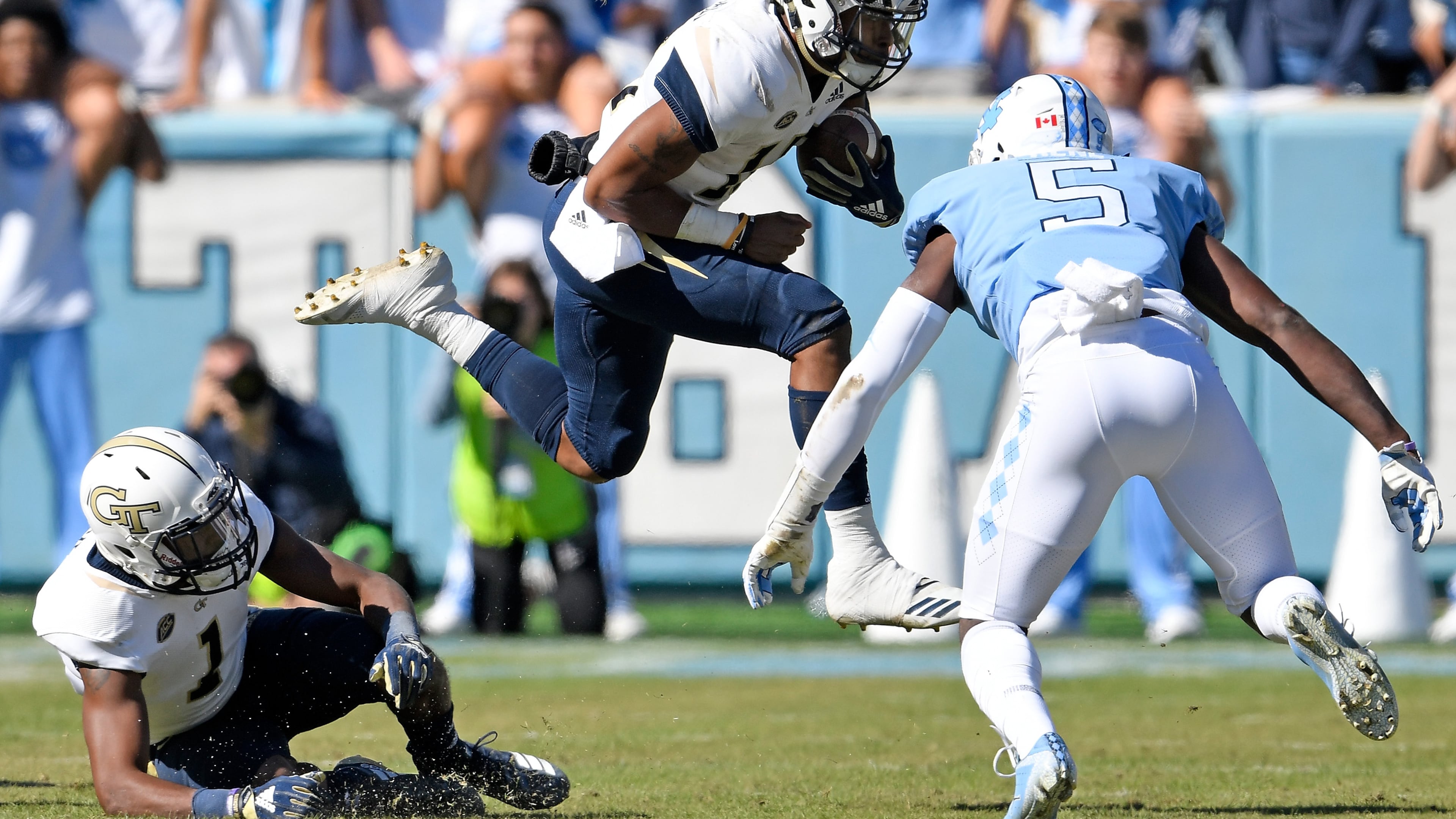 Patrice Rene (5) of the North Carolina Tar Heels looks to tackle Tobias Oliver of the Georgia Tech Yellow Jackets in the first half of their game at Kenan Stadium on November 3, 2018 in Chapel Hill, North Carolina. (Photo by Grant Halverson/Getty Images)