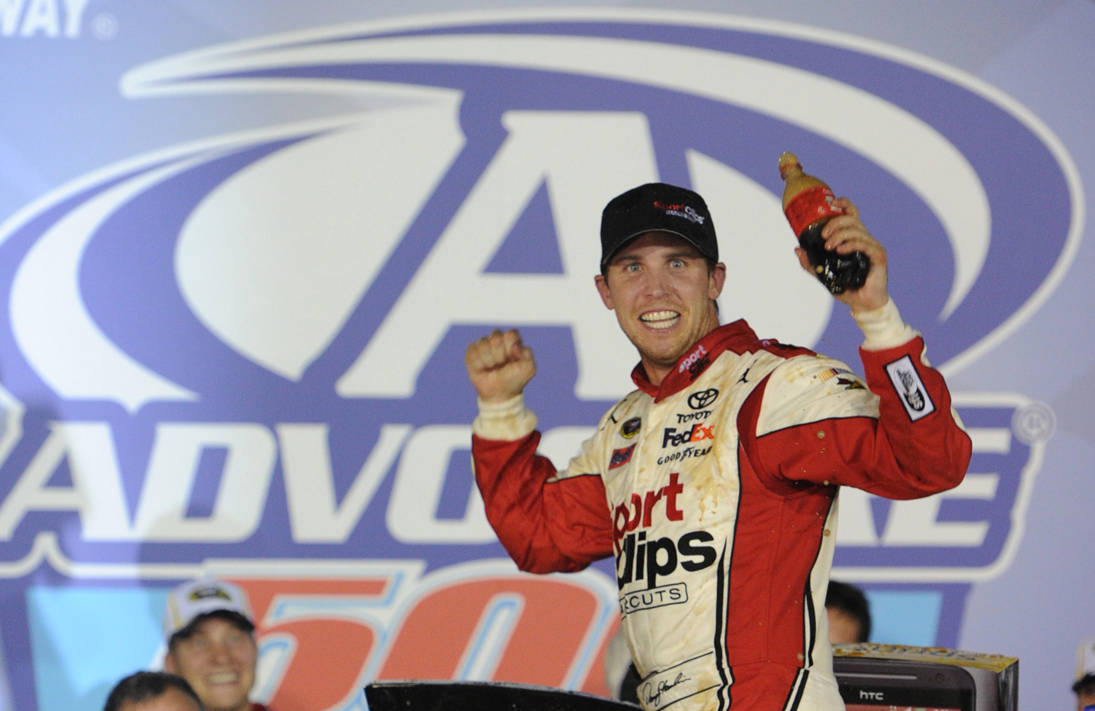 September 2, 2012 - Hampton: Denny Hamlin celebrates after winning the the AdvoCare 500 at the Atlanta Motor Speedway in Hampton on Sunday, September 2, 2012. JOHNNY CRAWFORD /JCRAWFORD@AJC.COM